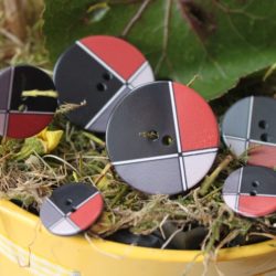 Boutons - Quadricolores : noir satiné majoritaire