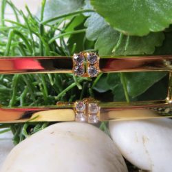Attache - or et 4 strass