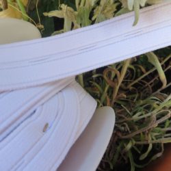Elastique - boutonnières blanches