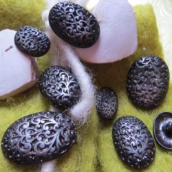 Bouton - Noir oval à arabesques