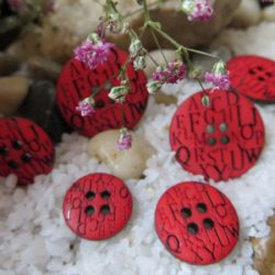 Bouton - Lettres noires sur fond rouge
