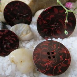 Bouton - Ramures rouges sur noir