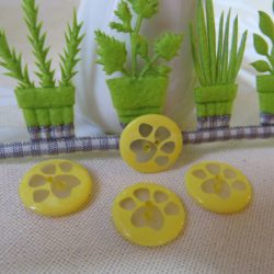 Bouton - Rond jaune et trace de patte transparente