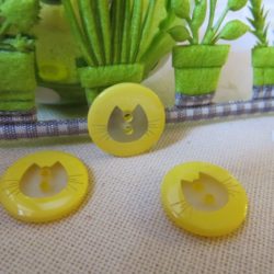 Bouton - Rond jaune et tête de chat transparente