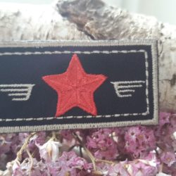 Motif - Etoile rouge, surpiqures beiges