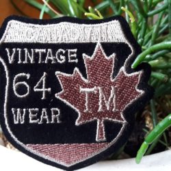 Motif - "VINTAGE 64 WEAR" sur fond noir