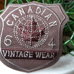 Motif - "VINTAGE 64 WEAR" sur fond beige