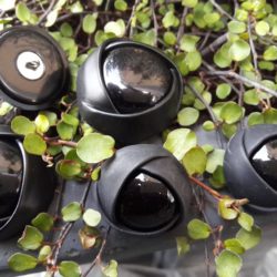 Bouton - Oeil diaphragme à 3 volets