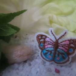 Motif - Petit papillon bleu, rose et brun