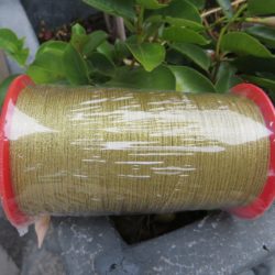 Mouliné métallisé doré en cône de 100g.
