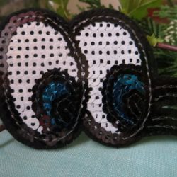 Motif - Yeux bleus et cils à paillettes