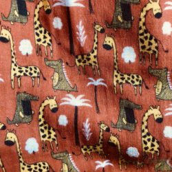 Tissu - Gaze "Girafes et crocodiles" rouille